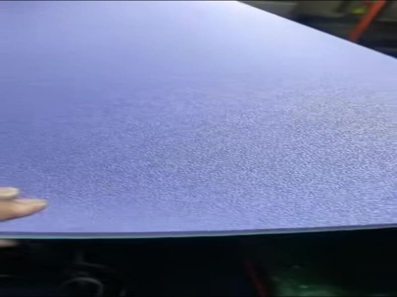 Close-up inspection of a failure plane after a field peel test
